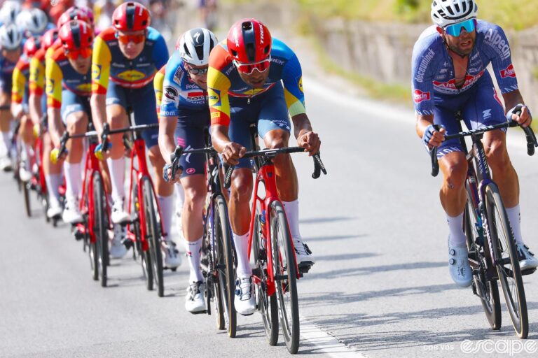 Amanuel Ghebreighzabhier leads a line of riders on stage 5 of the Giro d'Italia as his Lidl-Trek team chases a breakaway.
