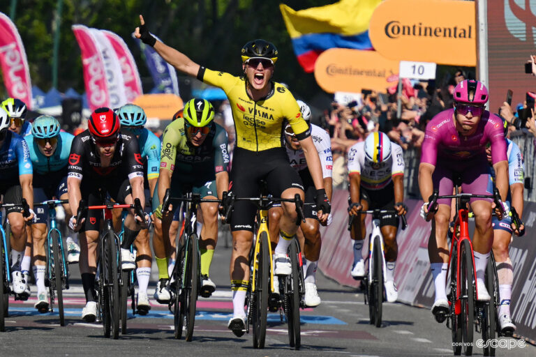 Olav Kooij celebrates stage 9 victory in Naples at the 2024 Giro d'Italia.