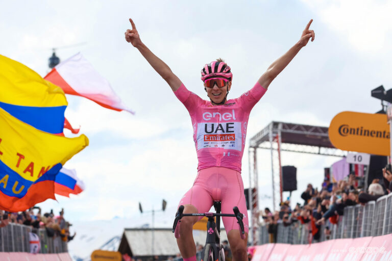 Tadej Pogačar dressed head to toe in pink as leader of the Giro celebrates stage 15 victory at the 2024 Giro d'Italia.