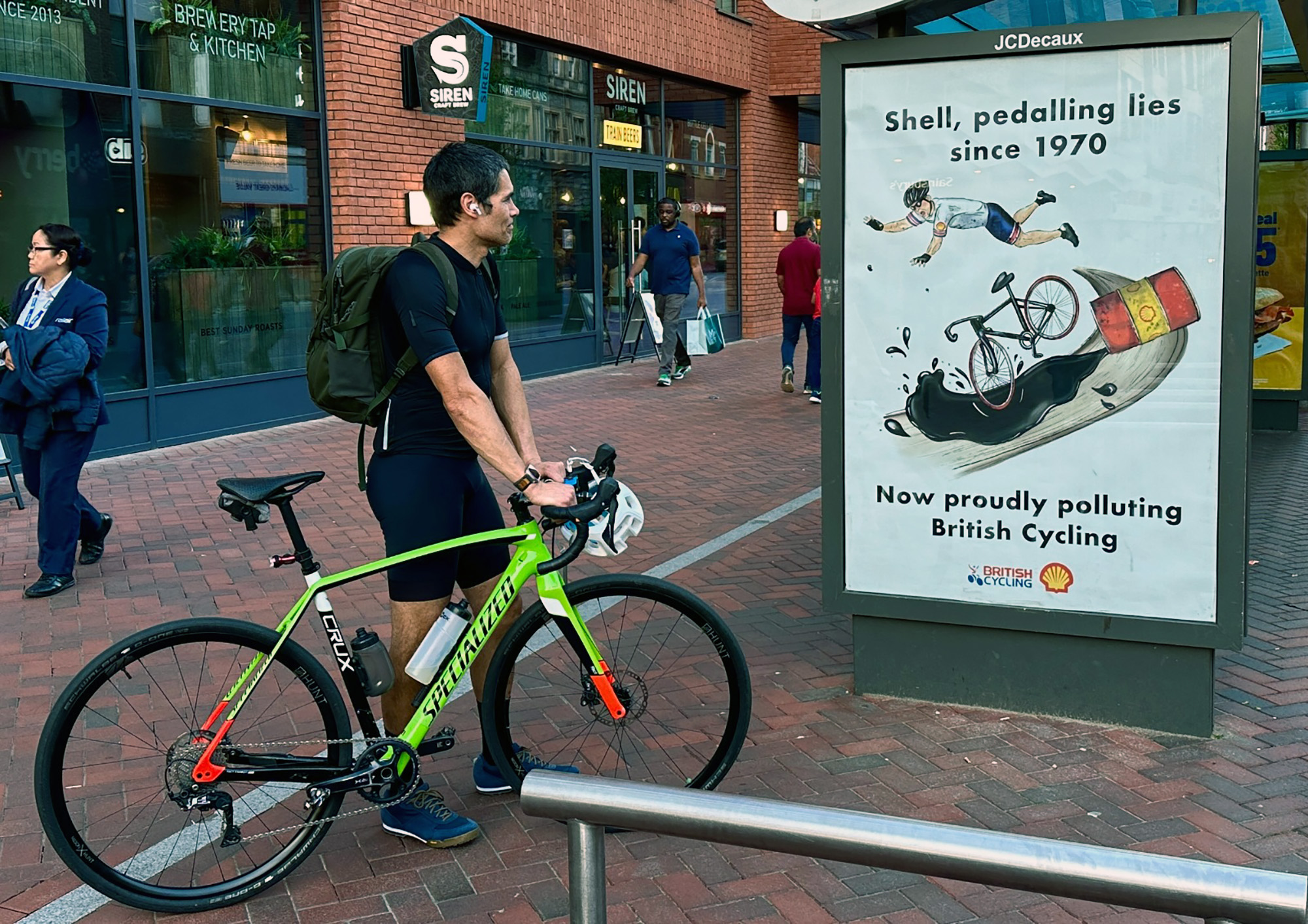 A poster protesting Shell and its sponsorship of British Cycling.