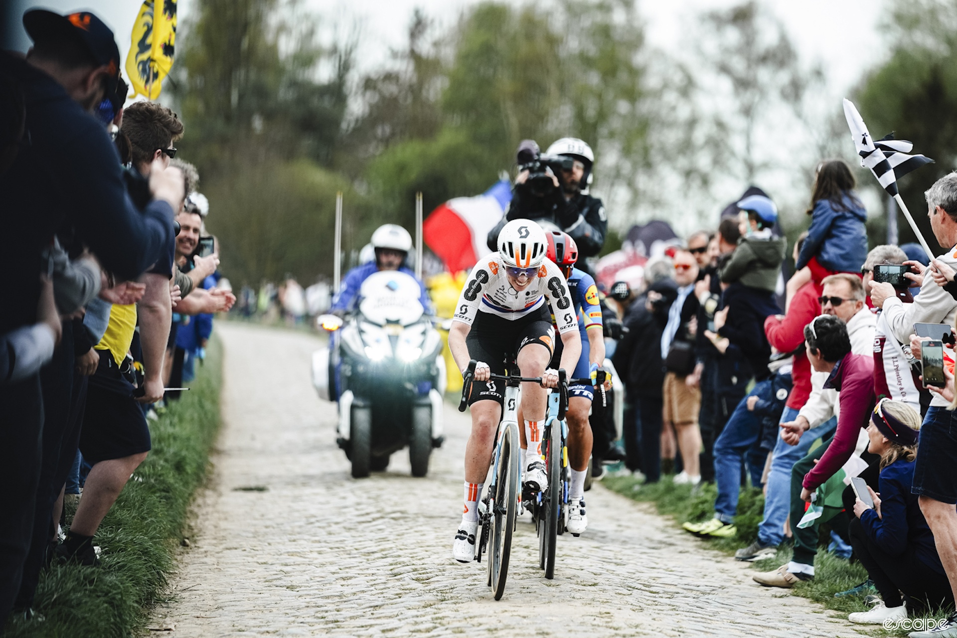 Georgi rides in front of Elisa Balsamo over cobbles during Paris-Roubaix Femmes. 