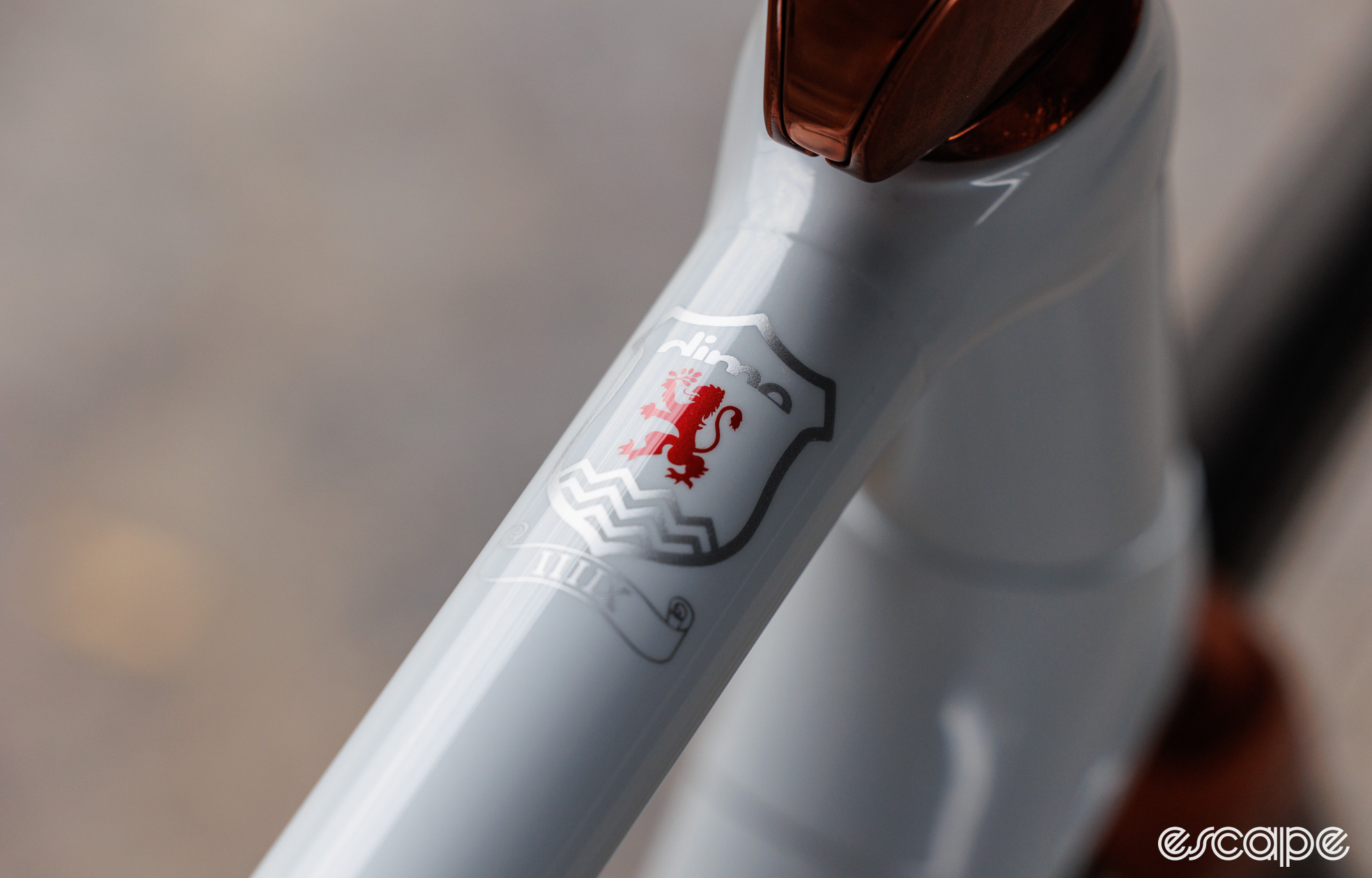 Family crest on the white top tube. 