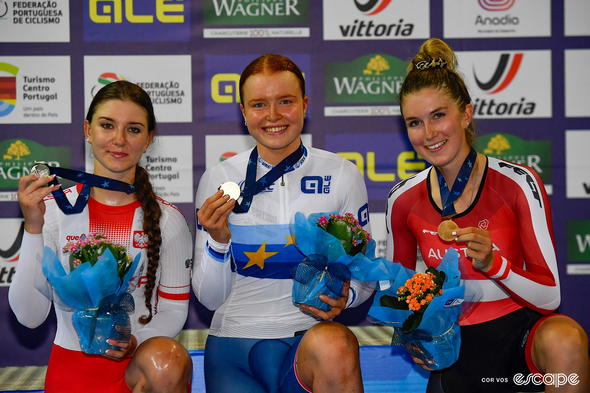 Kate Richardson (centre) after winning the U23 European Individual Pursuit title in 2023.
