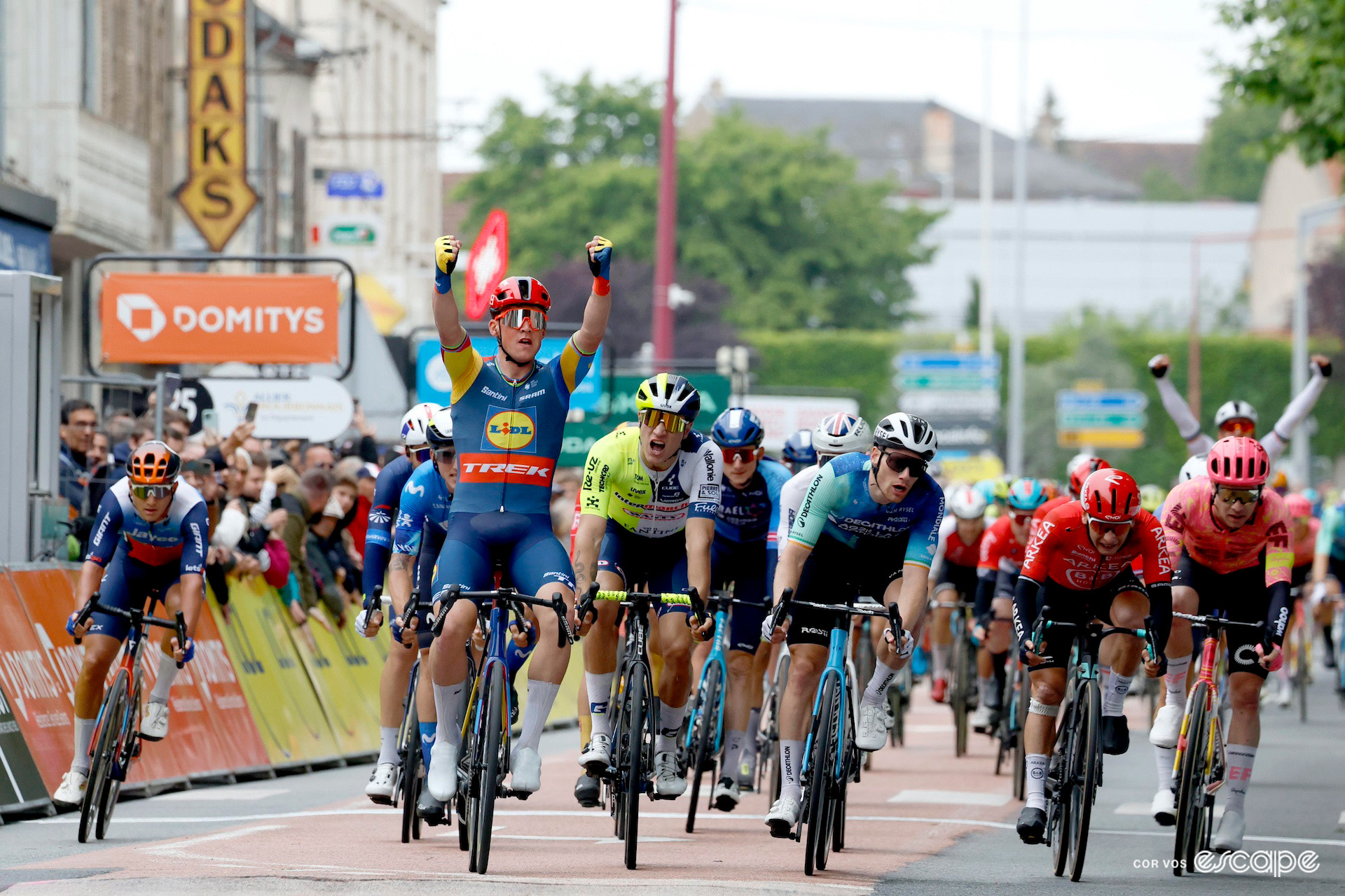 Mads Pedersen celebrates victory in the stage 1 bunch sprint at the 2024 Critérium du Dauphiné.