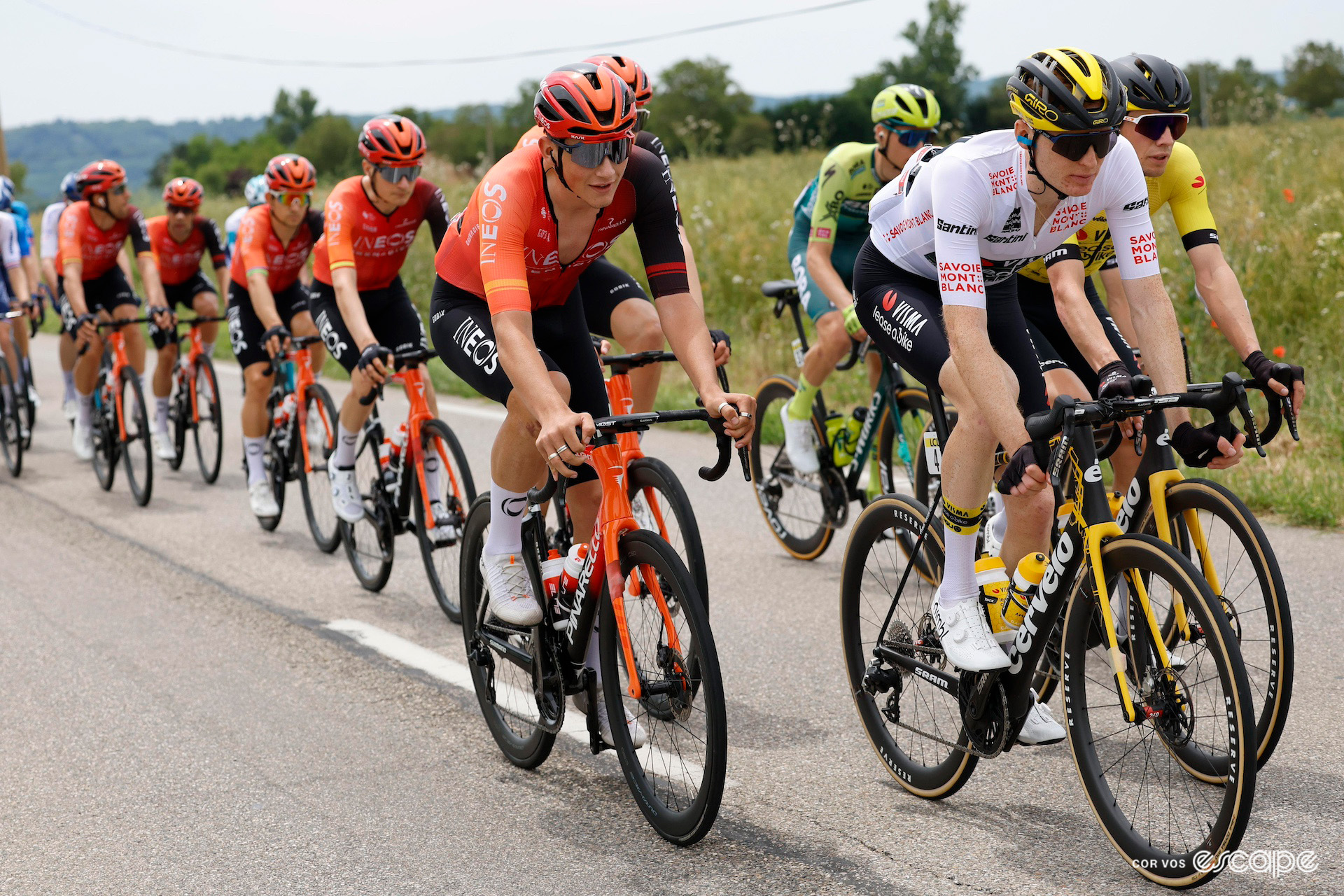 Josh Tarling at the head of the Ineos Grenadiers train alongside Matteo Jorgenson in the white jersey during stage 6 of the 2024 Critérium du Dauphiné.