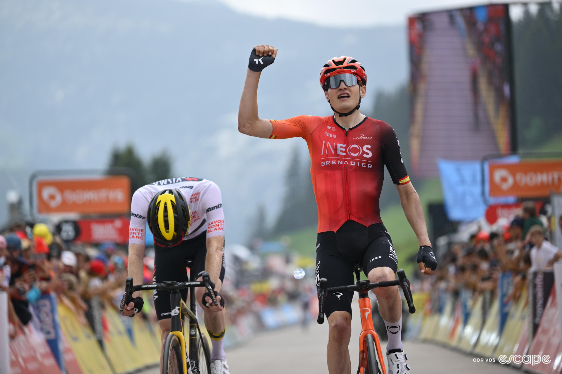 Carlos Rodríguez celebrates stage 8 victory just ahead of Matteo Jorgenson at the 2024 Critérium du Dauphiné.