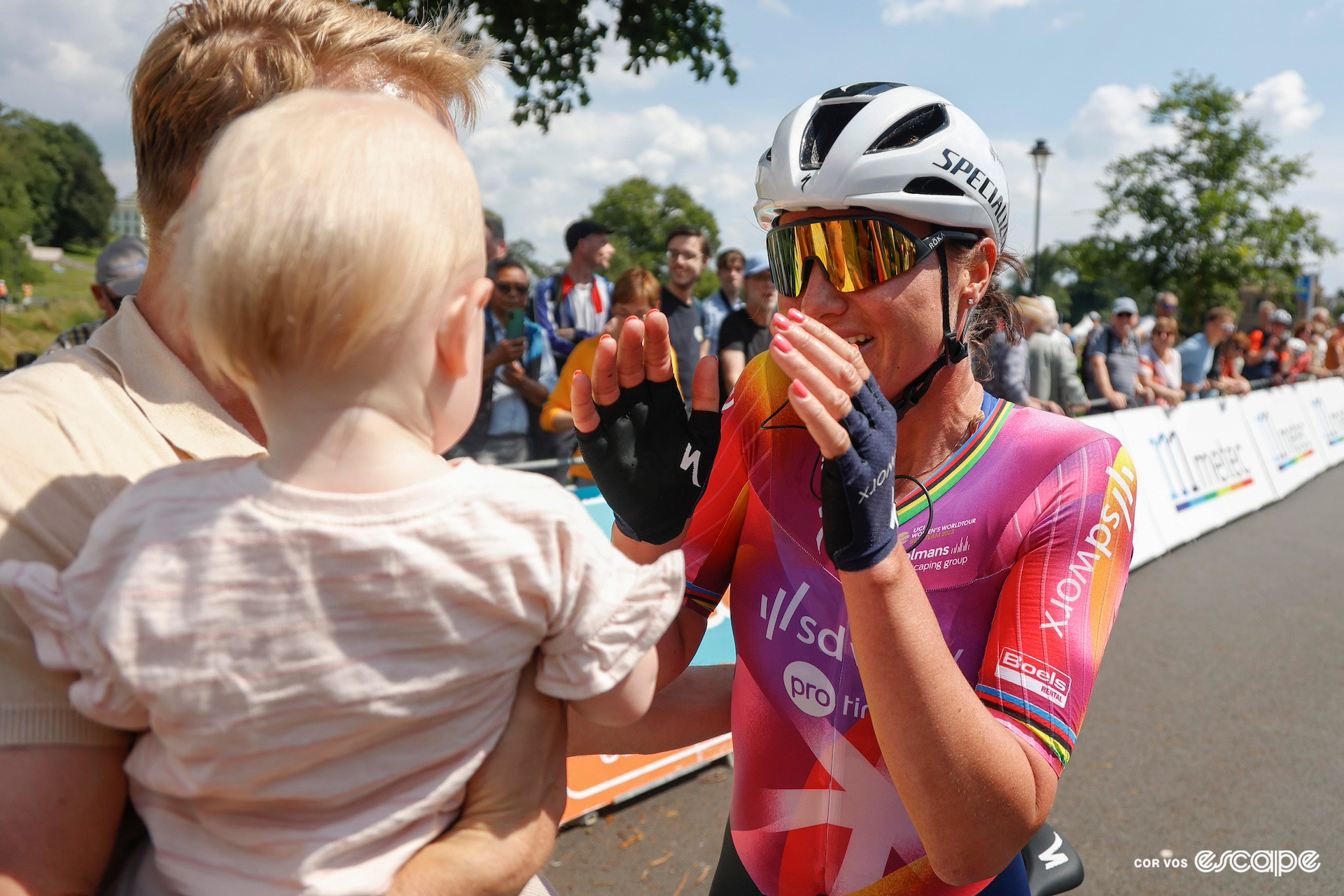 Chantal van den Broek-Blaak emotionally celebrates victory at the Dutch national road championships with her one-year-old daughter and partner.