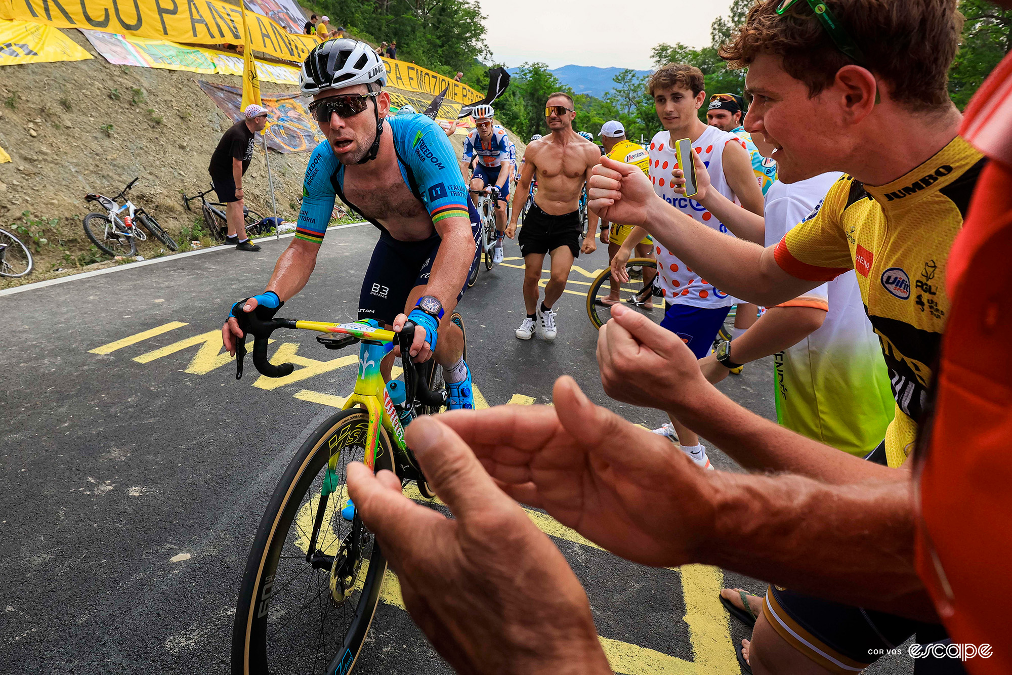 Mark Cavendish climbs during stage 1 of the 2024 Tour de France.