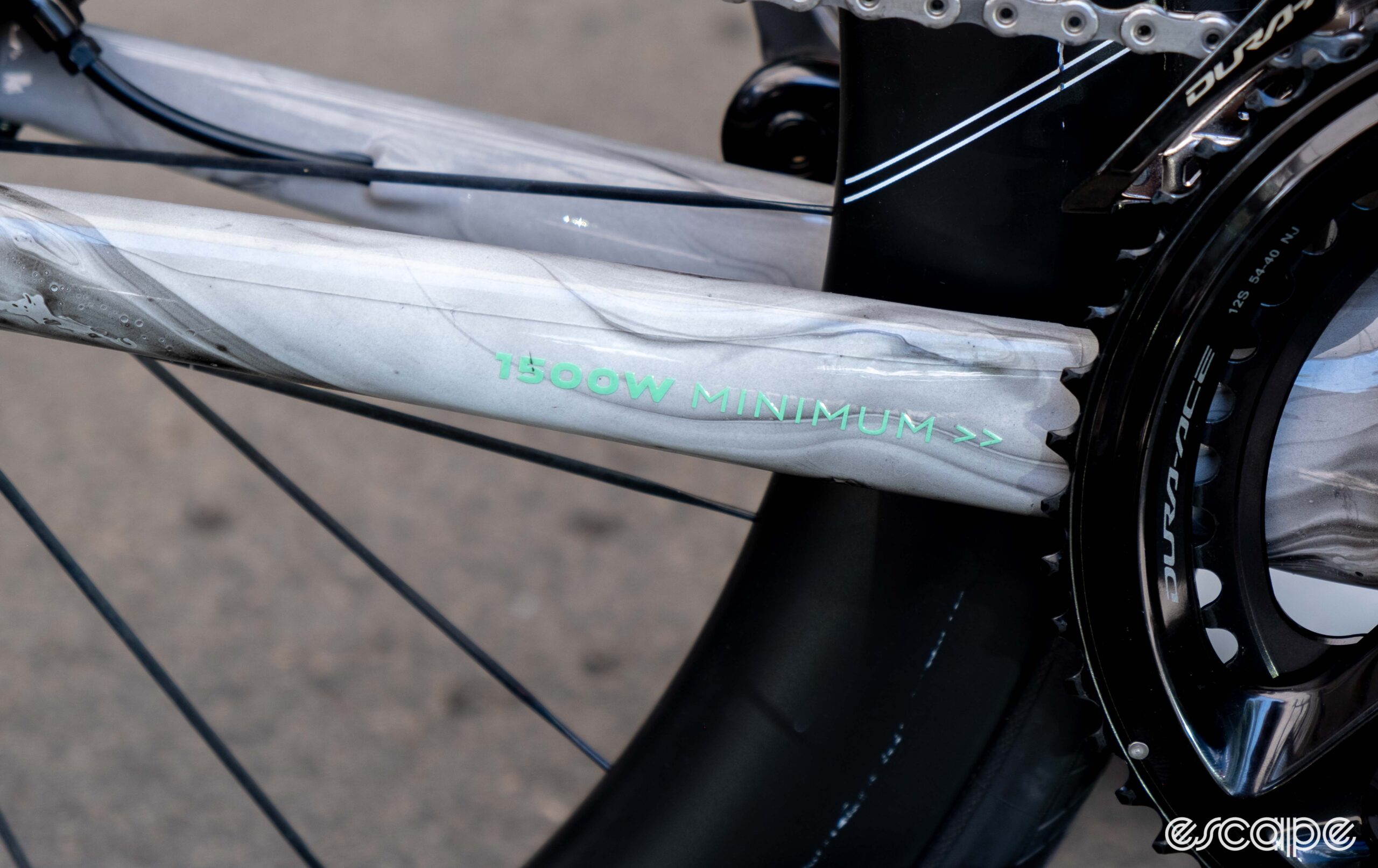 The photo shows Van Rysel's new FCR Pro aero bike chain stay which says "1500 watt minimum"