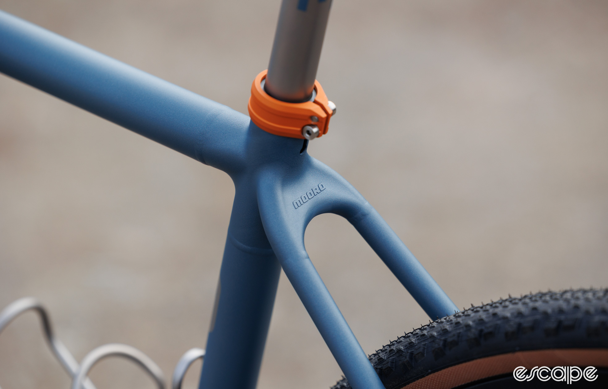 A 3D-printed titanium lug at the seat tube junction. 