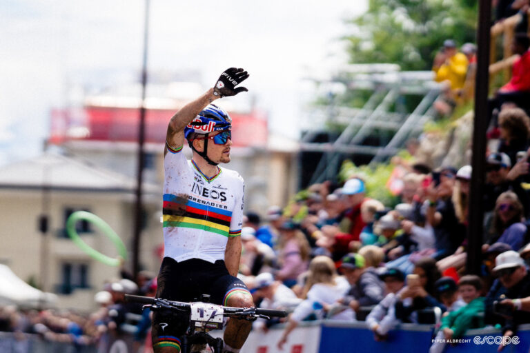 World champion Tom Pidcock waves to the crowd on winning the XCO title at MTB World Cup Crans-Montana in Switzerland.