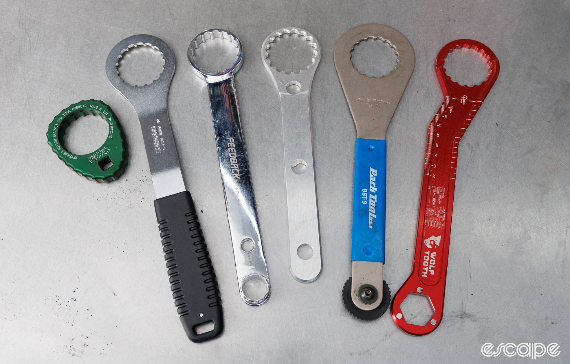 A variety of spanner-style bottom bracket tools that work with centerlock lockrings. Image shows tools from RWC, Shimano, Feedback Sports, WCM, Park Tool, and Wolf Tooth. 
