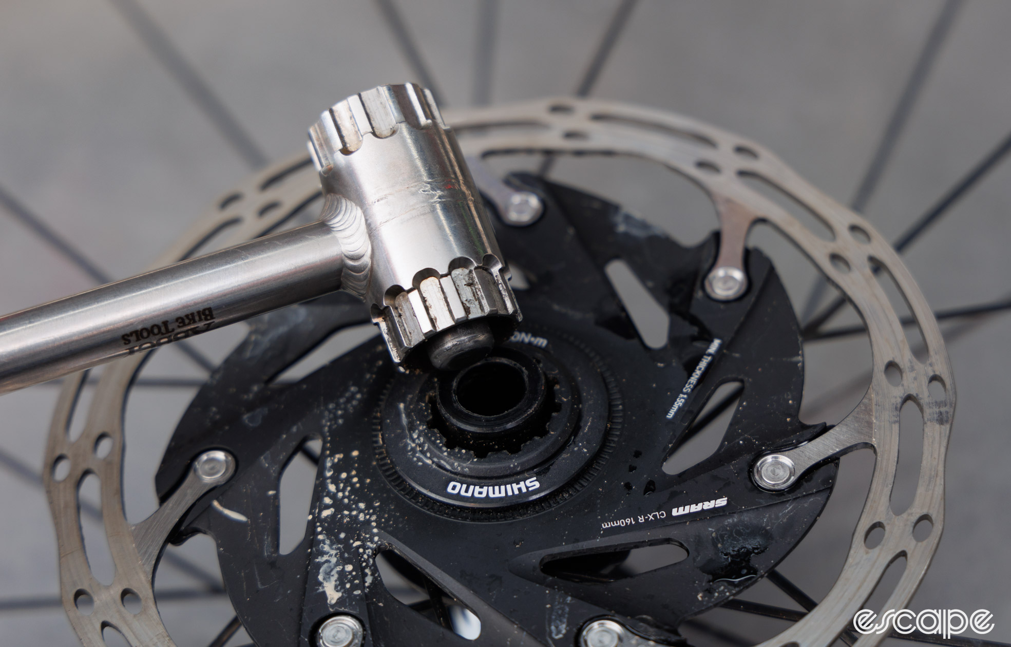 An Abbey Bike Tools Crombie sits ontop of a rotor lockring. 