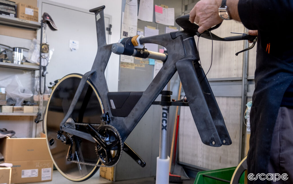 The photo shows the prototype frame being assembled. 