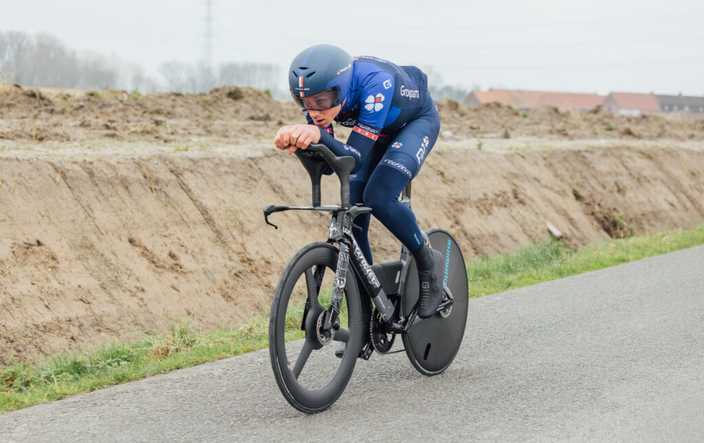 The image shows Stefan Kung testing the new bike in Belgium.
