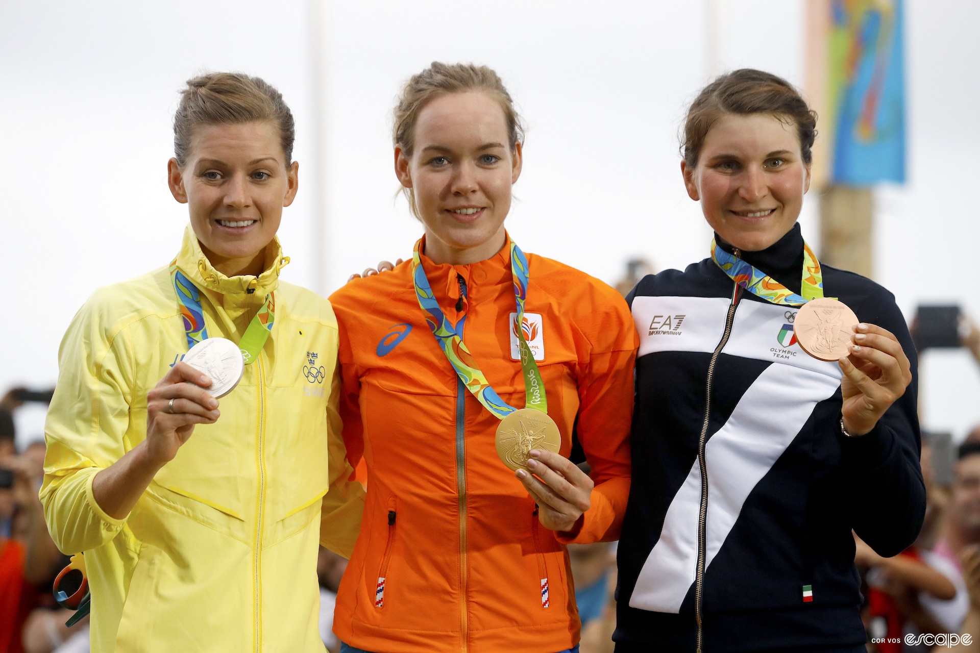 Emma Johansson, Anna Van Der Breggen, and Elisa Longo Borghini on the Olympic road race podium in 2016. 