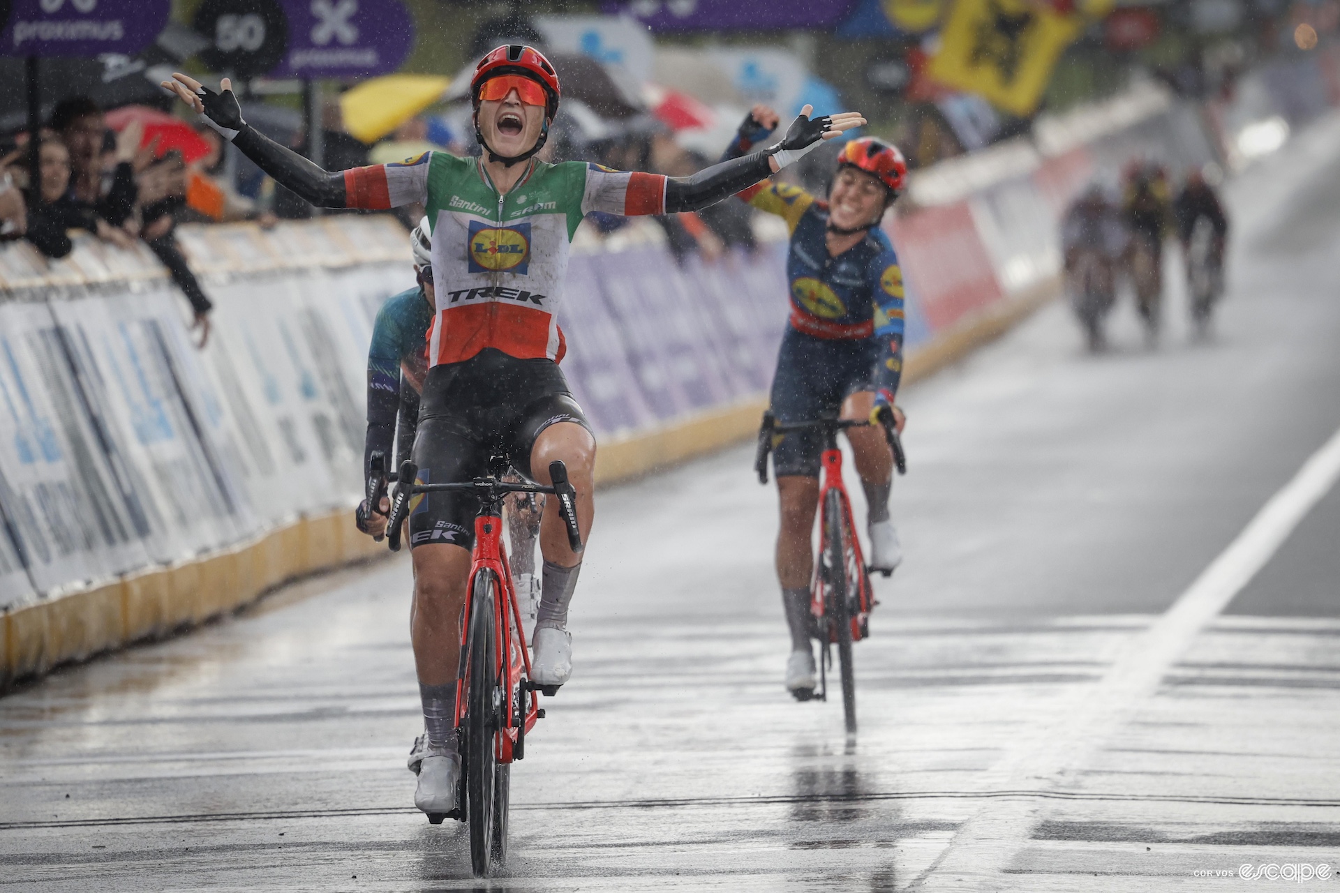 Elisa screaming as she crosses the line first at Tour of Flanders. 