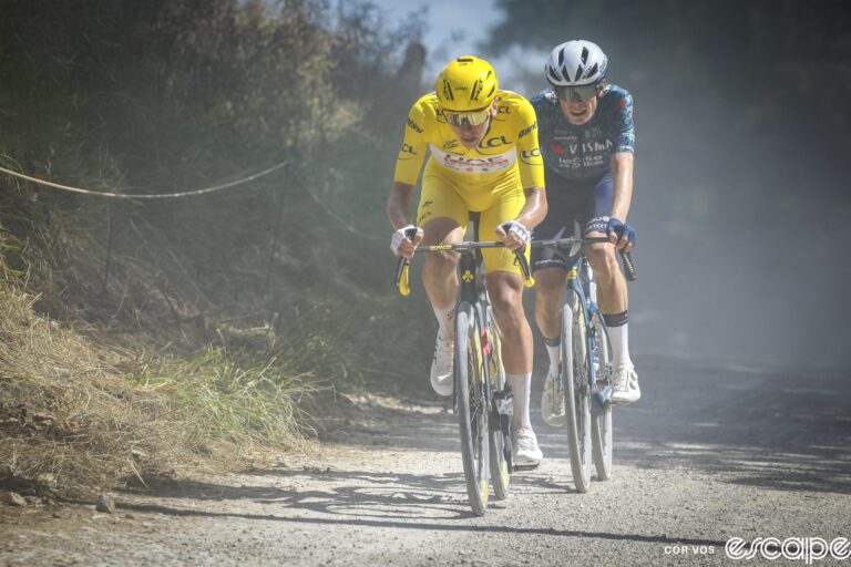 Tadej Pogačar leads Jonas Vingegaard on a section of white gravel roads on stage 9 of the 2024 Tour de France.
