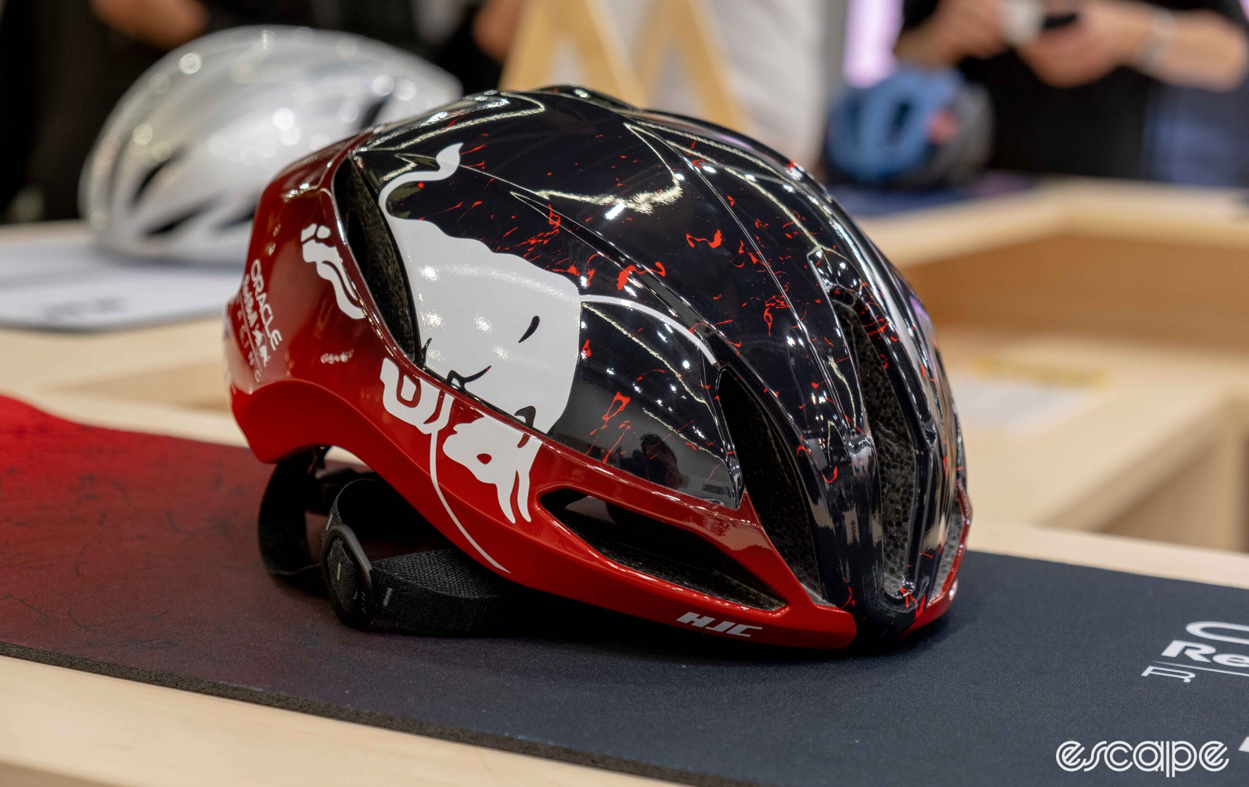 The photo shows the HJC Furion 2.0 helmet in Red Bull Racing colours