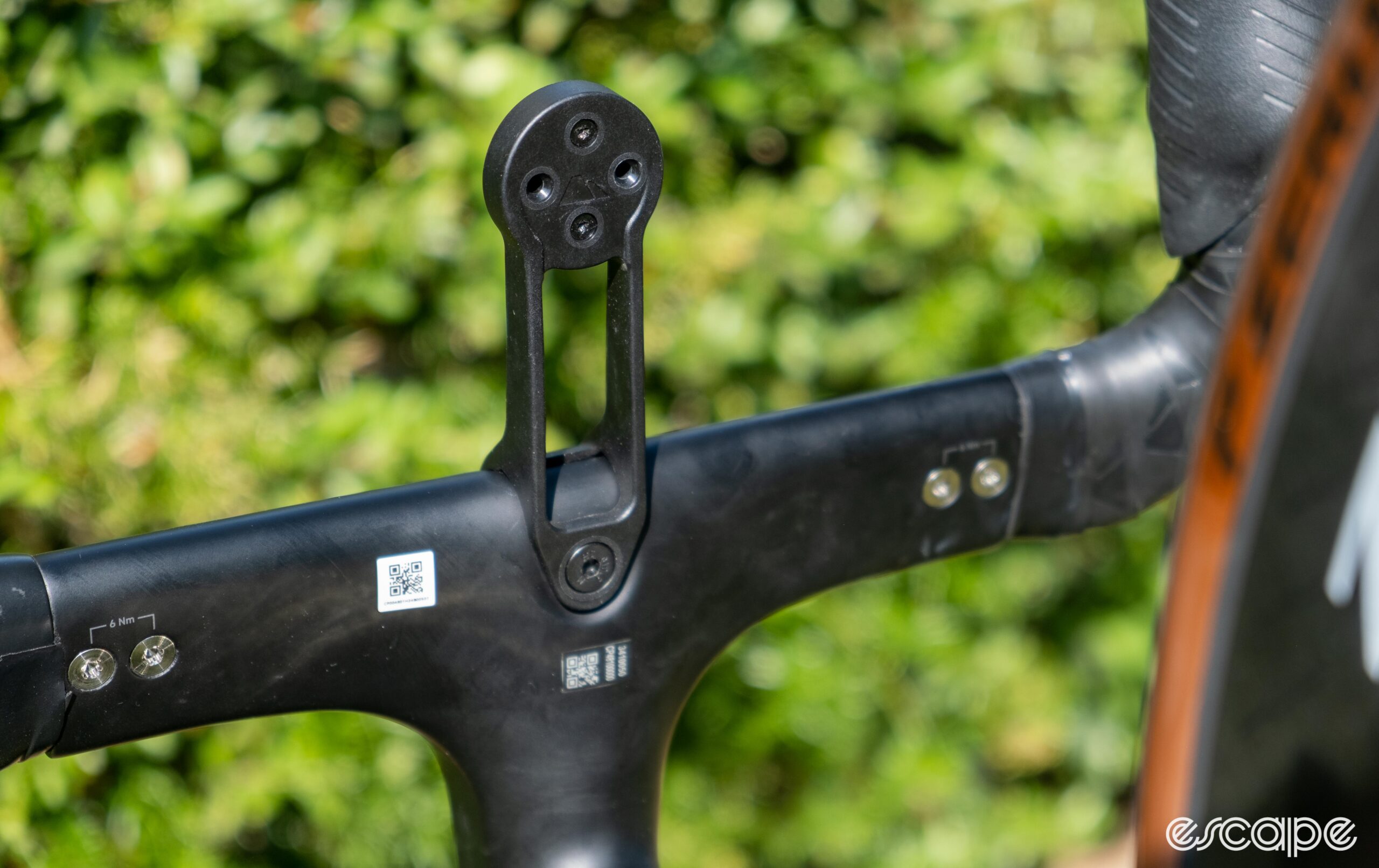 The photo shows the underside of the computer mount on Canyon's new PACE bar classic drops removed from the bike