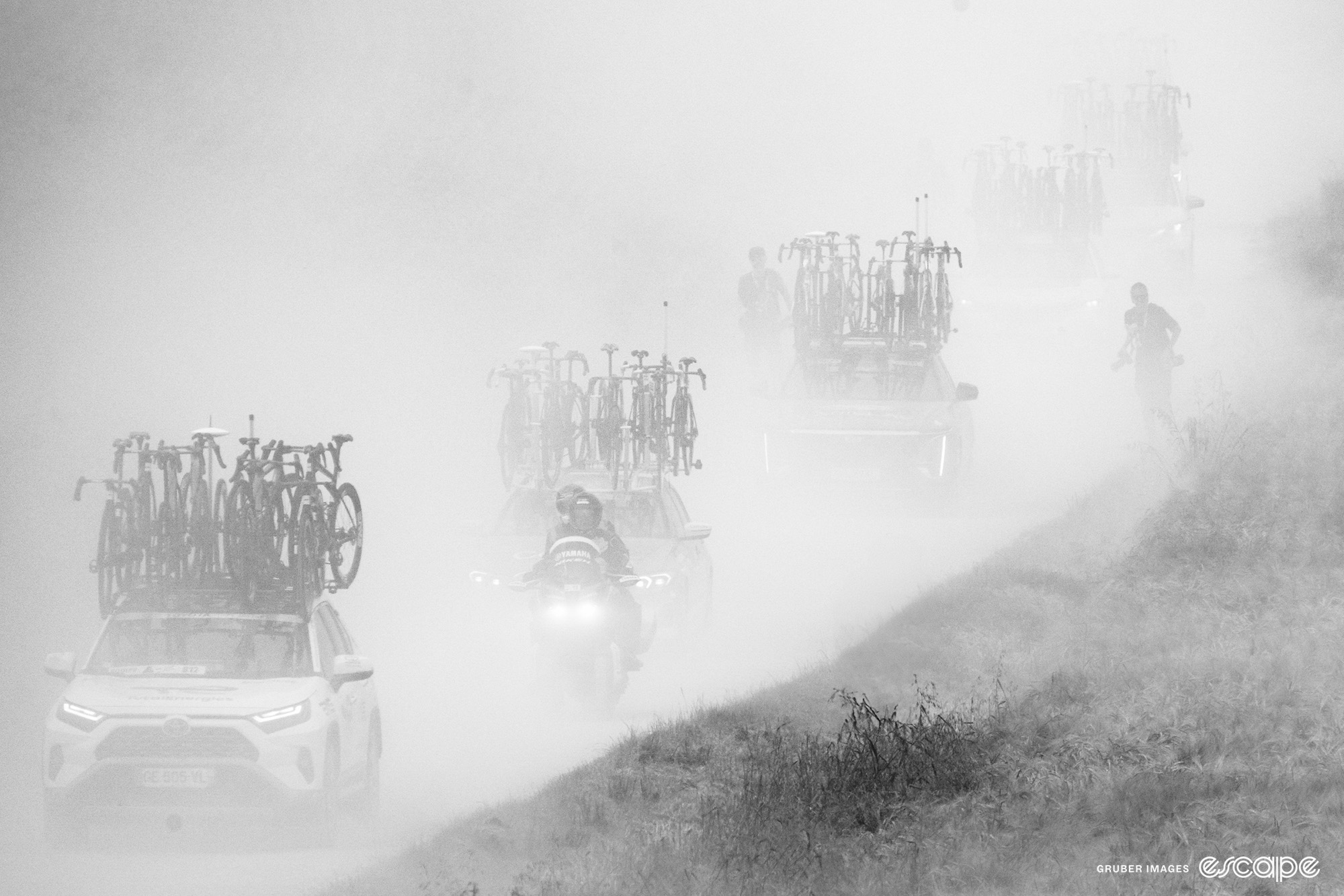 Dust rises during stage 9 of the 2024 Tour de France.