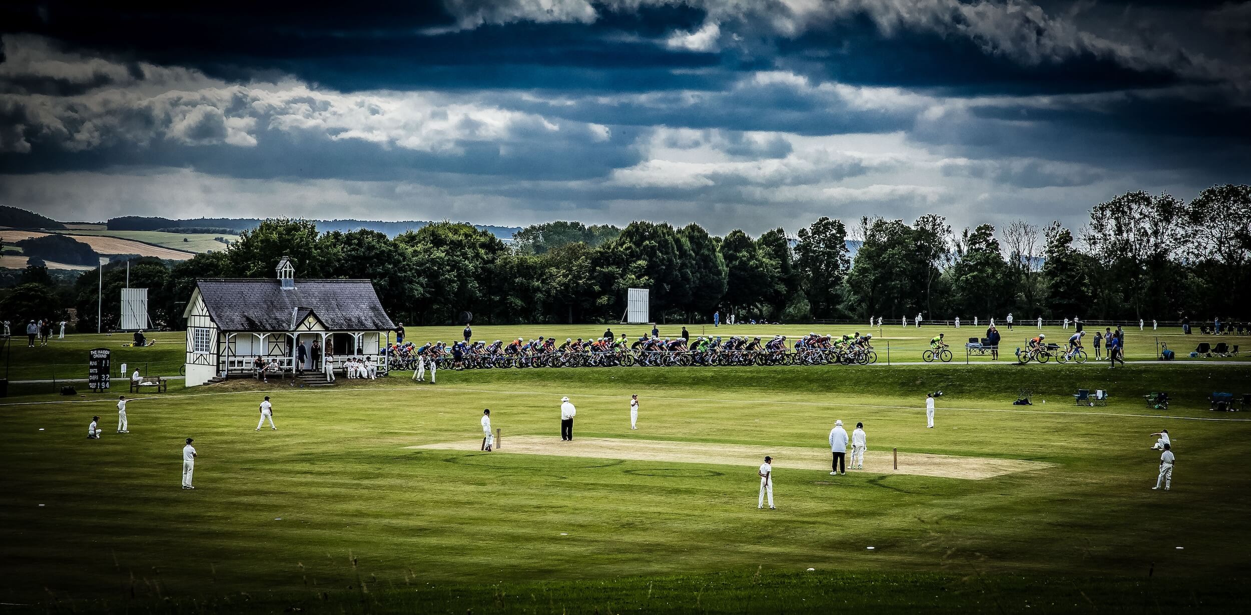 Two of my favourite sports in the same photo. I will say I have never seen a cricket match and a bike race in the same photo. Here taken at Ryedale on the last race to be held here. ⁤| Photo by Gary Main @garymainphotographer |